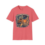 A coral pink short-sleeve crewneck t-shirt featuring a graphic print of a surfer riding a wave with the text 'CATCH WAVES NOT FEELINGS' arched above, displayed on a clean white background.